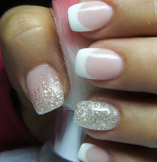 A person holding a pink and white manicure for Quinceanera