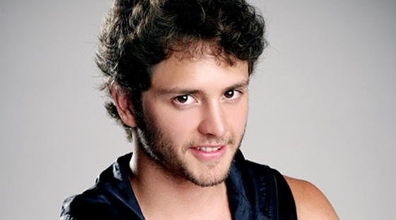 Christopher von Uckermann, a man with curly hair and a leather vest, at the Quinceanera of Dulce María e Christopher