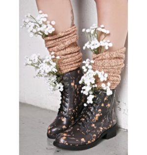 A pair of Quinceanera boots decorated with flowers