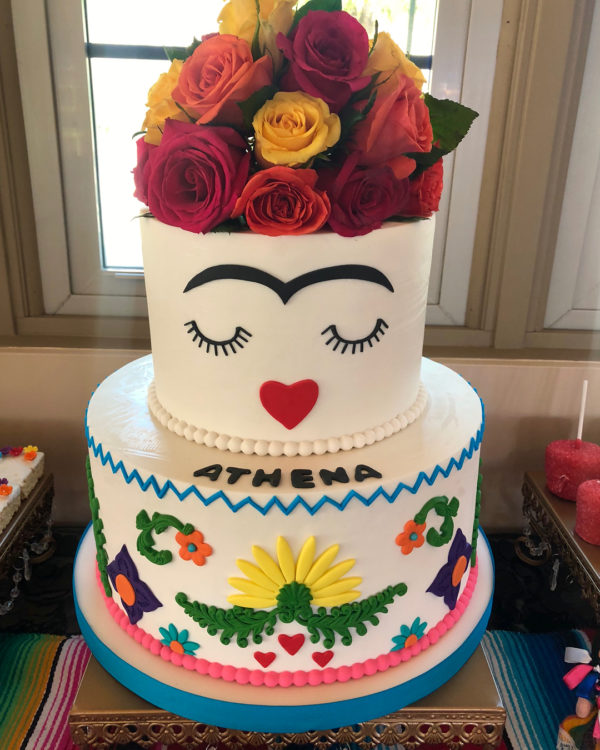 Cake decorating, a cake decorated with flowers and a fridable for a Quinceanera