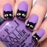 A Quinceanera-themed image of a person holding a purple nail polish with black cats on it