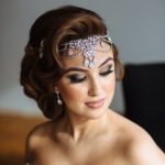 Quinceanera headpiece - A woman in a quinceanera dress is posing for a picture