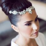 Quinceanera hair pieces comb, a woman in a white dress is wearing a headband