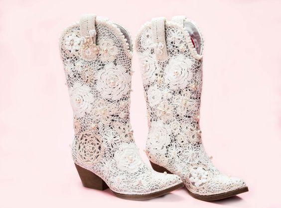 Pair of high heeled white Cowboy Boots on a pink background, perfect for a Quinceanera celebration