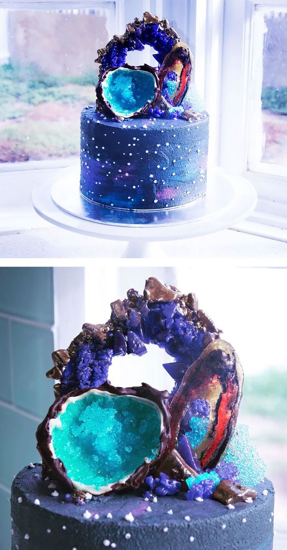 Quinceanera cake, a cake with a blue and purple space nebula design on top of it