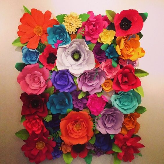 A collage of photos of a Quinceanera flower crown with Mexican flower decorations