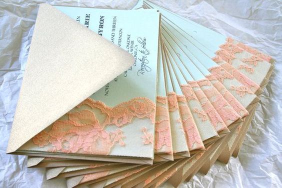 Quinceanera Invitation, a stack of folded cards with lace on them
