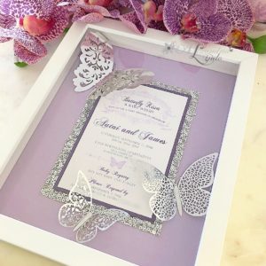 A picture of a lilac Quinceanera invitation
