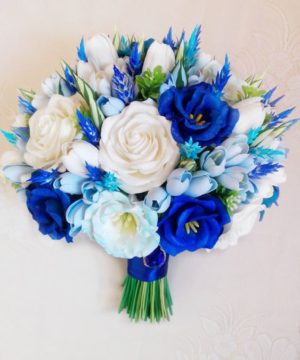 Quinceanera blue and white tulip bouquet, a beautiful flower bouquet on a table