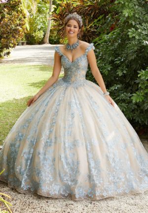 Quinceanera - Vizcaya by Morilee Dress 89407, a woman posing for a picture in a ball gown