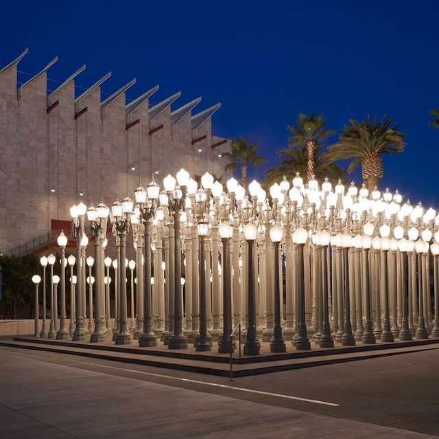 Quinceanera image: Los Angeles County Museum of Art with a group of street lights in front of a building