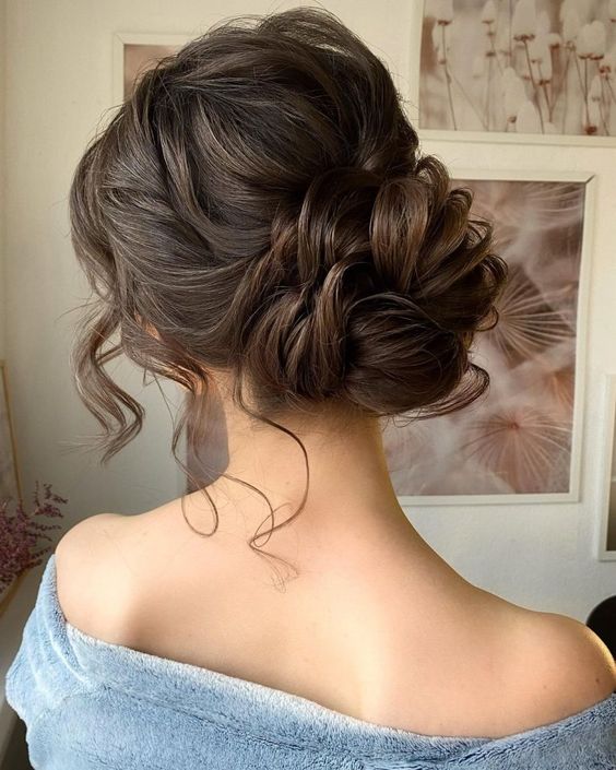 Quinceanera hairstyle, the back of a woman's head with a messy updo