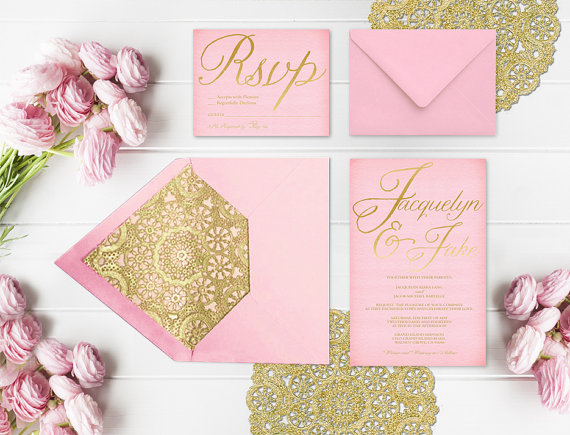 A pink and gold Quinceanera invitation with gold foil and petal design