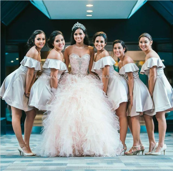 Quinceañera dresses, a bride and her bridesmaids posing for a picture, with quinceañera damas