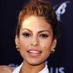 Quinceanera: Eva Mendes, a beautiful woman in a white dress, posing for a picture