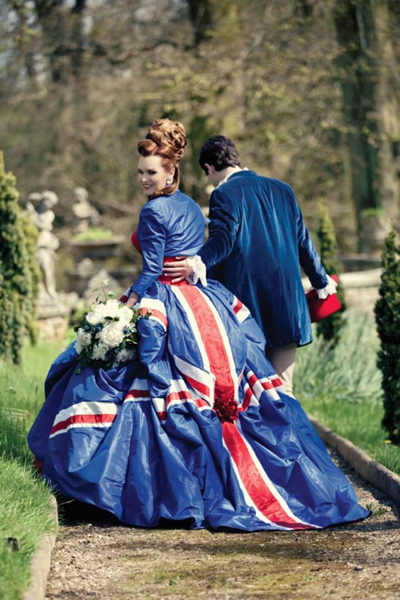 A Quinceanera celebration with a British flag wedding dress from United Kingdom and a gold wedding cake with pink flowers on a table