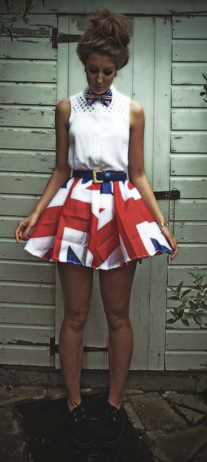 A fashion model Quinceañera, standing in front of a door wearing a skirt