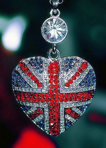 A pendant with a heart shape featuring a Union Jack, representing a Quinceanera