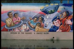 The Great Wall of Los Angeles, a community-based art mural on the side of a building, showcasing Quinceanera themed artwork