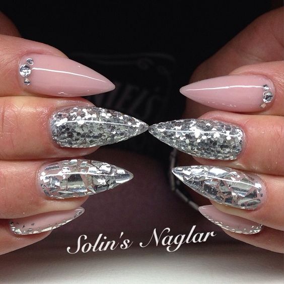 Quinceanera nail manicure, a pair of hands with silver and pink nails