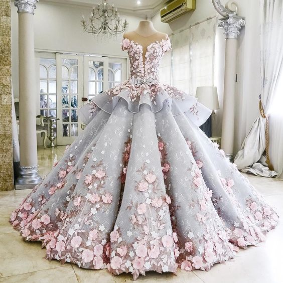 Quinceanera dress on mannequin stand in a room
