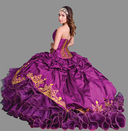Purple quinceañera dress designed by April