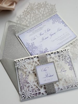 A close up of a Quinceanera invitation on a table