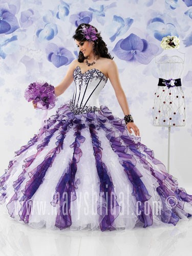 A woman wearing a purple and white quinceanera dress with a red lips makeup look