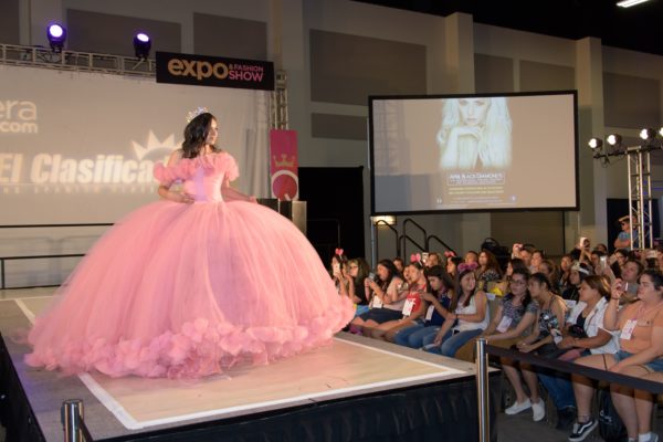 Quinceanera puffy dresses - Quinceañera dresses, a woman in a pink dress on a runway