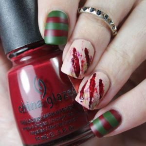 Scary Halloween nail designs with a red and green manicure