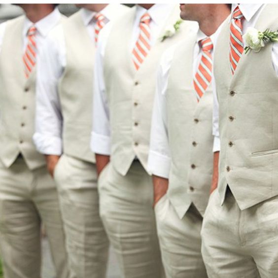 A group of men in vests and ties standing next to each other wearing garçon d'honneur tenue Suits