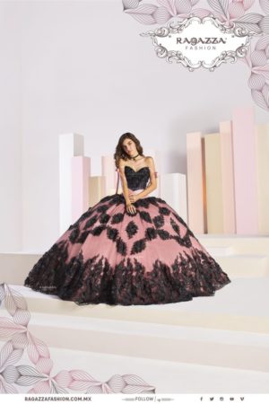 A woman in a black and pink Quinceañera dress sitting on a white platform