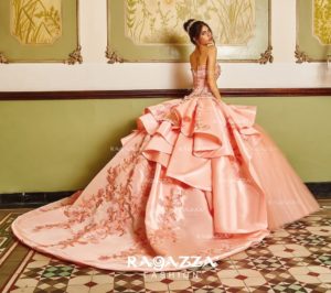 A woman posing for a picture in a pink Quinceañera dress, a vestidos de 15 años ragazza 2022 Quinceañera dress creation