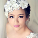 Quinceanera: A woman in a Quinceanera dress with a flower in her hair