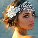A Quinceanera girl wearing a white lace headband with flowers