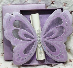 Quinceanera invitation: a purple butterfly with a ribbon in a box