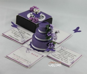 A lilac Quinceanera Ceremony Supply, showcasing a purple Quinceanera cake placed on a table