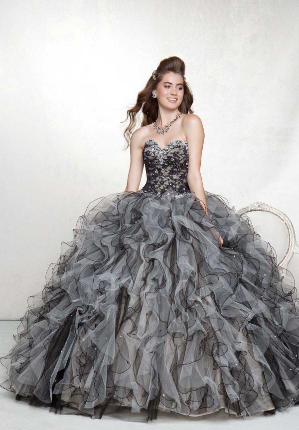 Tina Cohen Chang in a gray Quinceañera dress posing for a picture