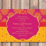 A Quinceanera invitation featuring an orange and pink design, placed on a wooden background.
