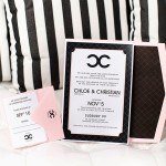 A couple of black and white striped bags with party supply CHANEL logo