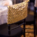 A close up of a Quinceanera chair with a bag on it