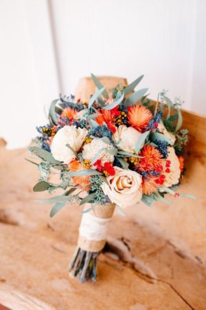 Quinceanera flowers color palette bridal bouquet, a bouquet of flowers sitting on top of a wooden bench