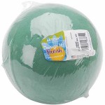 A green plastic ball with a label on it for a Quinceanera celebration.