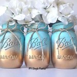 Quinceanera: Three mason jars with flowers in them on a table, DG Tower Mason jar