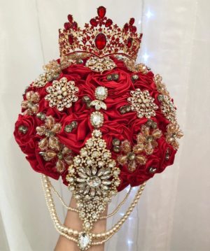 Quinceanera flower bouquet, a bridal bouquet with red roses and pearls
