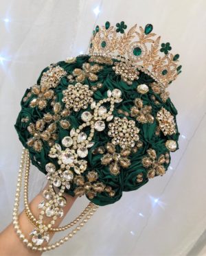 A Quinceanera floral design featuring a bouquet of green flowers adorned with pearls