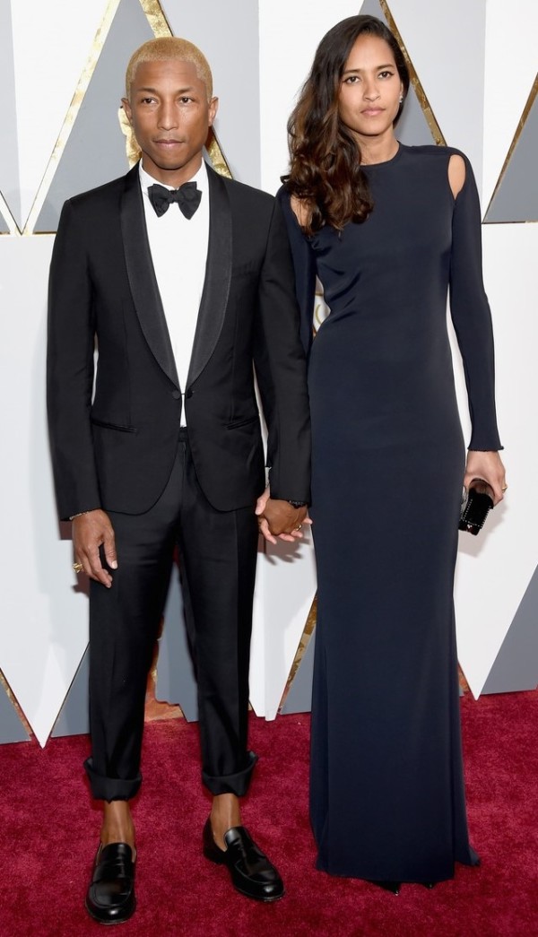 Quinceanera: Pharrell Williams, a man in a tuxedo, and a woman in a black dress