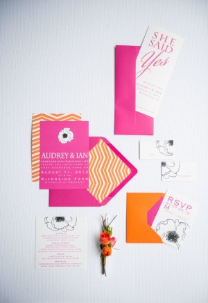 A couple of Quinceanera invitations on a table