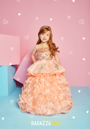 Cake decorating Quinceañera dresses, with a little girl in a pretty dress posing for a picture