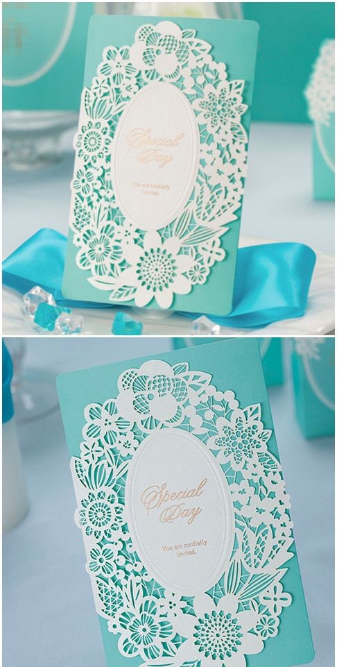 A close up of a Quinceanera invitation card with a blue ribbon